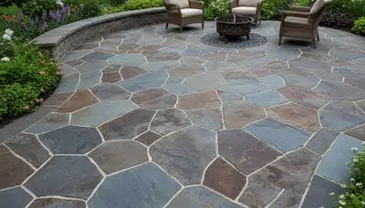 Flagstone patio installation with natural stone pavers by Chop Chop Landscaping in Detroit, MI